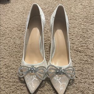 Elegant Cream Lace Heels with Silver Bow